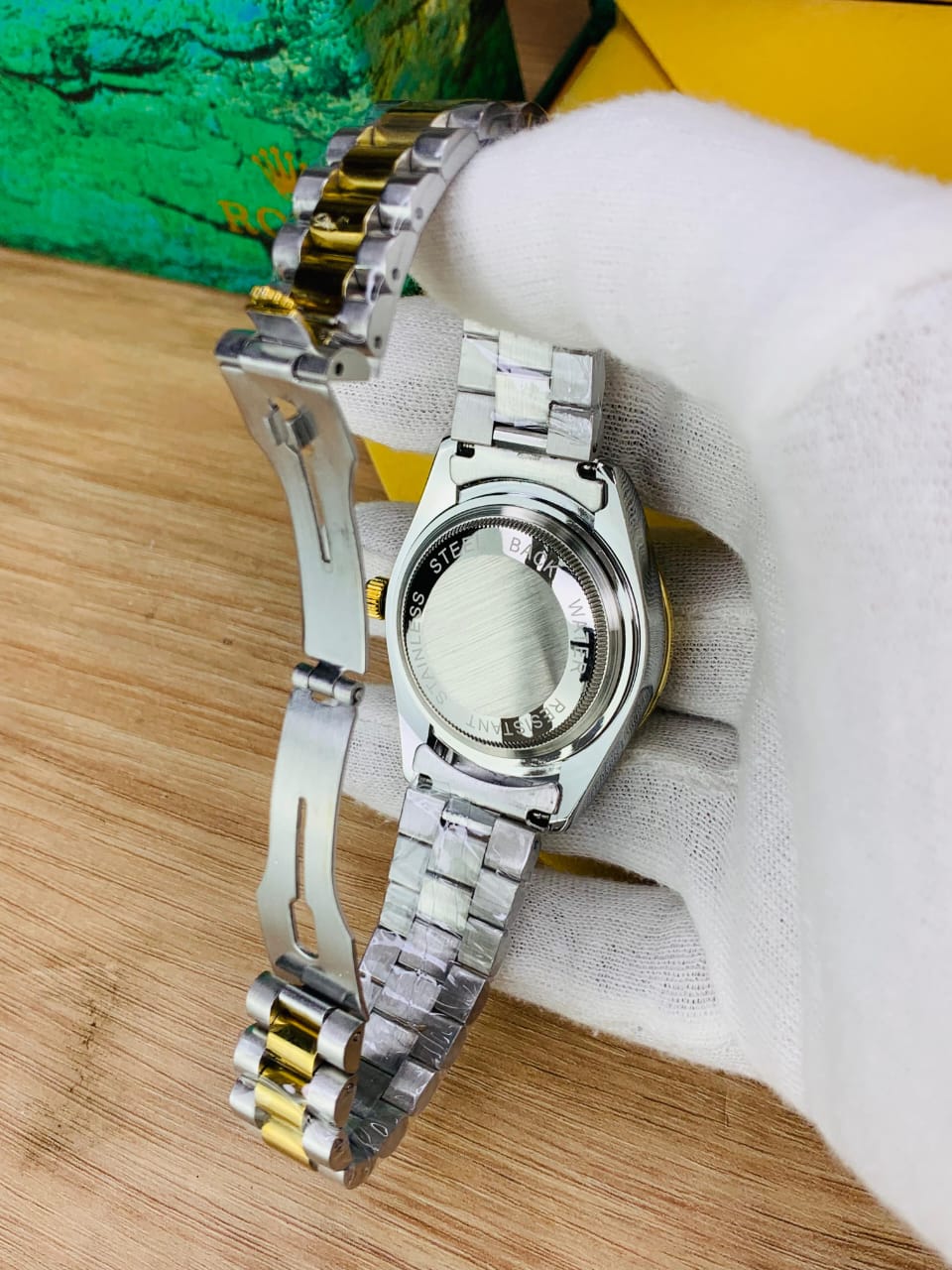 Rolex oyster perpetual two tone with white dial and date
