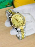 Rolex oyster perpetual two tone with Golden dial and date