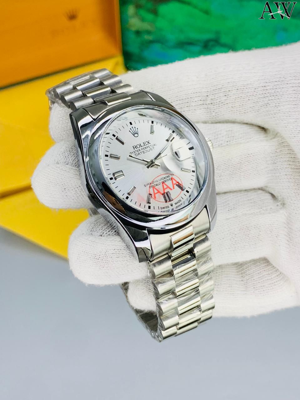 Rolex with date, signature crown and secure Master-lock clasp. ⌚✨