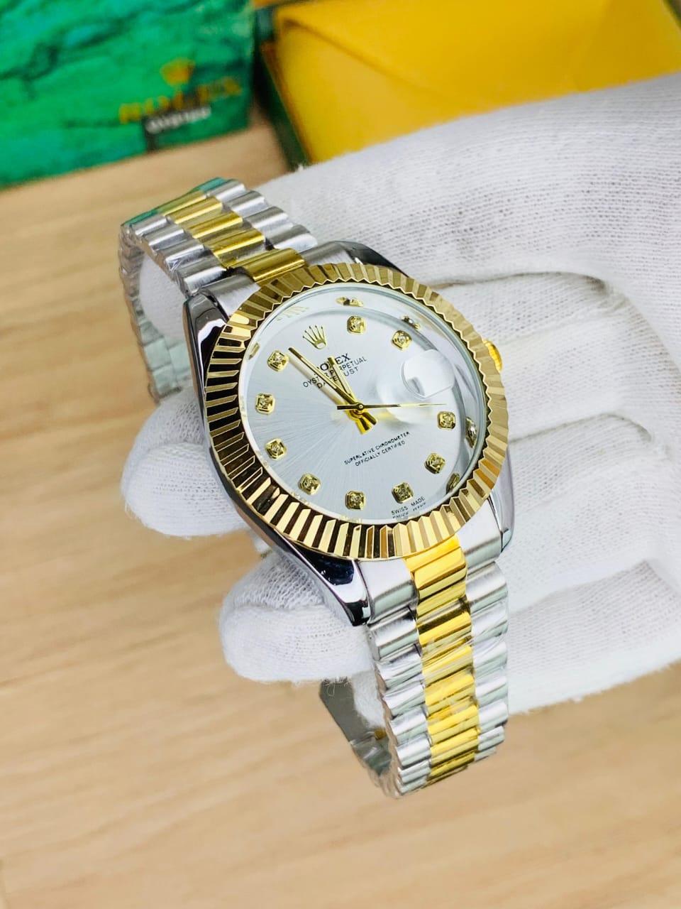 Rolex oyster perpetual two tone with white dial and date