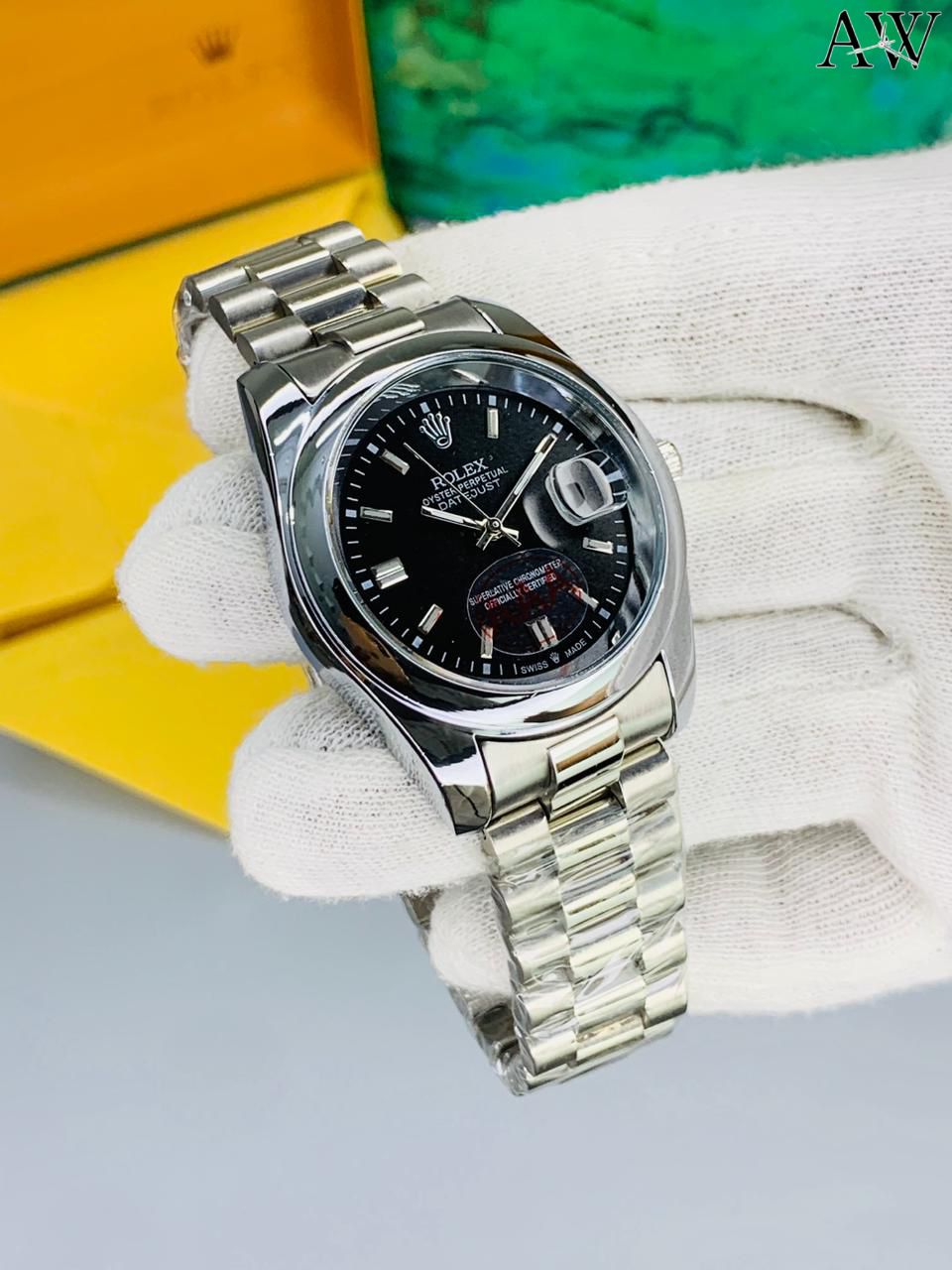 Rolex with date, signature crown and secure Master-lock clasp. ⌚✨